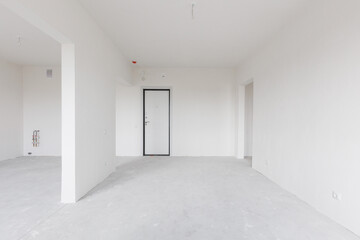 interior of the apartment without decoration in gray colors. rough finish