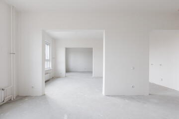 interior of the apartment without decoration in gray colors. rough finish