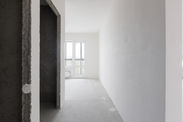 interior of the apartment without decoration in gray colors. rough finish