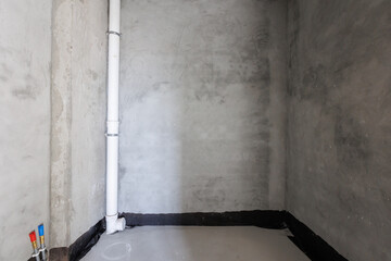 interior of the apartment without decoration in gray colors. rough finish