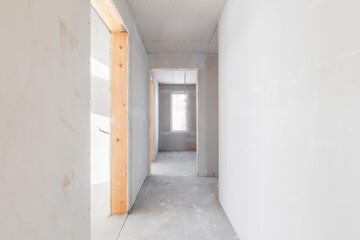 interior of the apartment without decoration in gray colors. rough finish