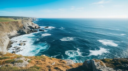 Fototapeta na wymiar Endless ocean stretching to the horizon from a cliff viewpoint