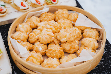 Sweet buns with cream, custard cake, tray pastries.