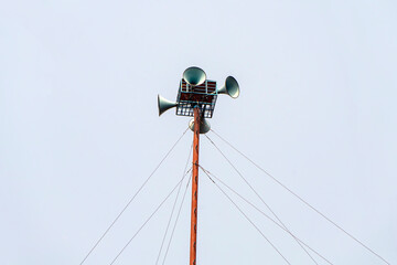 Streets Loudspeakers for important messages high on the mast, pillar.