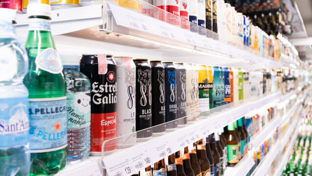 CHIANGMAI,THAILAND - January 3,2024 -Variety of Beer,Craft beer and Mineral water on Freezer shelves at Supermarket