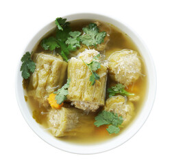 Bitter melon with minced pork and glass noodle clear soup top view. Thai food bitter melon with minced pork clear in white bowl