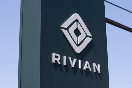 South San Francisco, CA, USA - May 1, 2022: Rivian sign is seen at a Rivian service center in South San Francisco, California. Rivian Automotive, Inc. is an American electric vehicle automaker.