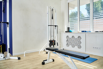 modern recovery equipment in spacious and comfortable gym of kinesiology center, advanced medicine