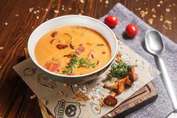 cheese soup with bacon and shrimp, chanterelle mushrooms, dark and moody, top new