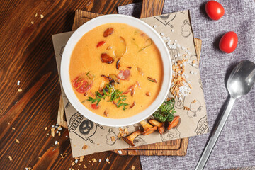 cheese soup with bacon and shrimp, chanterelle mushrooms, dark and moody, top new