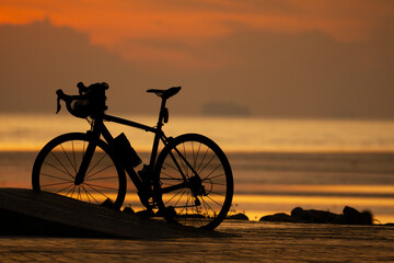 silhouette of a bicycle on sunset