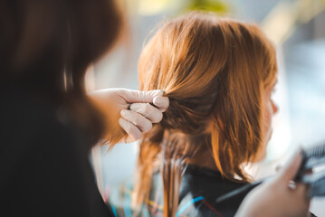 Asian Hairdresser giving treatment and barber occupation service, Professional hairstylist combing...