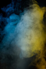 Blue and yellow steam on a black background.