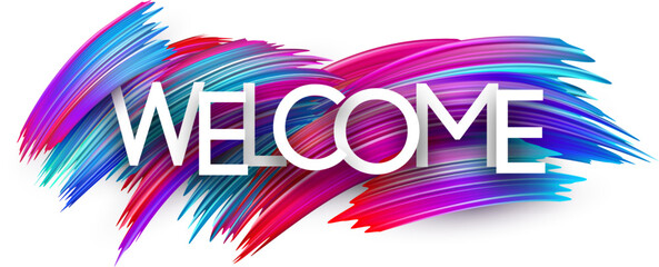 Welcome paper word sign with colorful spectrum paint brush strokes over white.