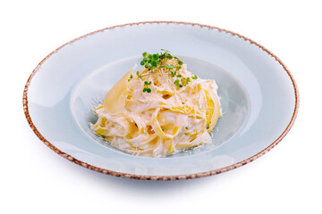 Tagliatelle pasta with cream sauce and parmesan cheese