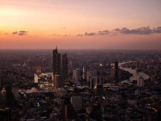 Naklejka na ściany i meble City of Radiance: Bangkok's Sunset Symphony.