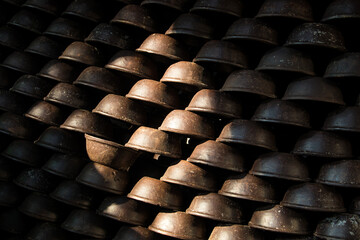 Pottery making involves shaping clay by hand, using a wheel, or coiling techniques.