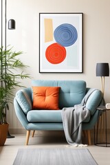 Blue armchair with orange pillow and gray blanket in living room