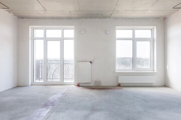 interior of the apartment without decoration in gray colors. rough finish