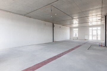 interior of the apartment without decoration in gray colors. rough finish