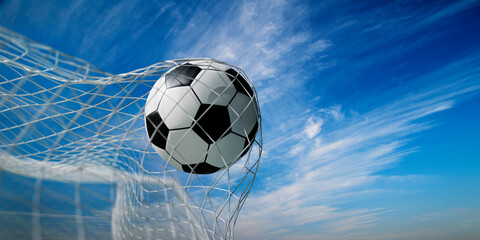 Closeup of soccer ball in goal net. Football play in front of blue sky background. Sport game championship background.