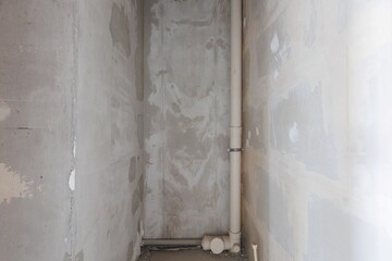 interior of the apartment without decoration in gray colors. rough finish