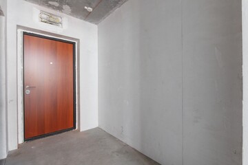 interior of the apartment without decoration in gray colors. rough finish