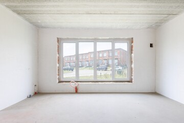 interior of the apartment without decoration in gray colors. rough finish