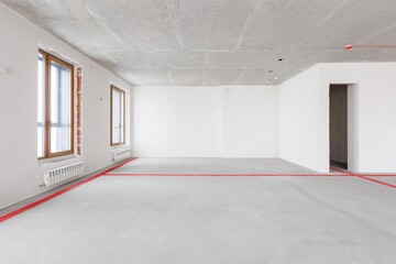 interior of the apartment without decoration in gray colors. rough finish