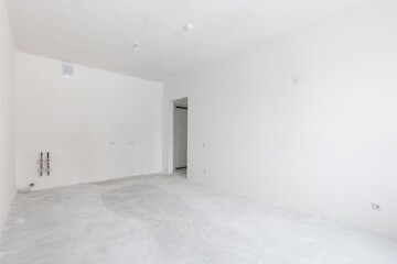 interior of the apartment without decoration in gray colors. rough finish