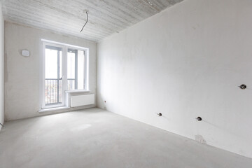 interior of the apartment without decoration in gray colors. rough finish