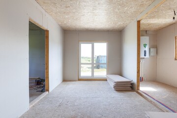interior of the apartment without decoration in gray colors. rough finish