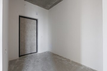 interior of the apartment without decoration in gray colors. rough finish