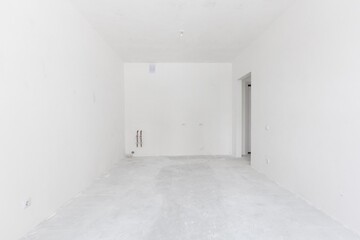 interior of the apartment without decoration in gray colors. rough finish