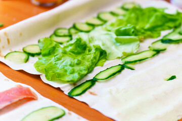 Preparation of a vegetarian snack with vegetables and pita bread