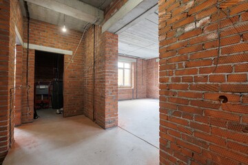 interior of the apartment without decoration in gray colors. rough finish