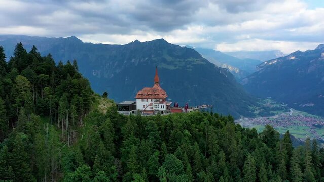 Beautiful top of Harder Kulm in Swiss Interlaken in summer sunset. Turquoise Lake Thun and Brienz in background. Stunning scenery on top of Harder Kulm over Interlaken. Berner Oberland, Switzerland