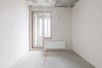 interior of the apartment without decoration in gray colors. rough finish