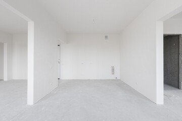 interior of the apartment without decoration in gray colors. rough finish