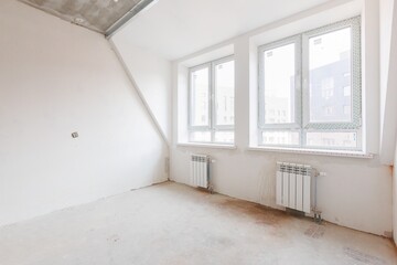 interior of the apartment without decoration in gray colors. rough finish