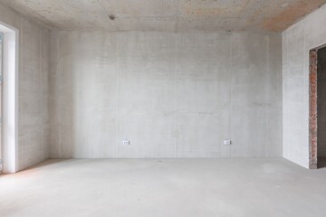 interior of the apartment without decoration in gray colors. rough finish