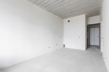 interior of the apartment without decoration in gray colors. rough finish
