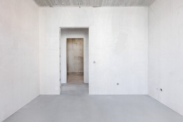 interior of the apartment without decoration in gray colors. rough finish