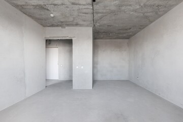 interior of the apartment without decoration in gray colors. rough finish