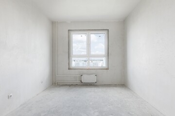 interior of the apartment without decoration in gray colors. rough finish