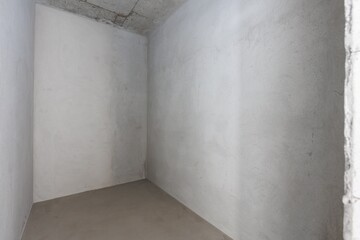 interior of the apartment without decoration in gray colors. rough finish