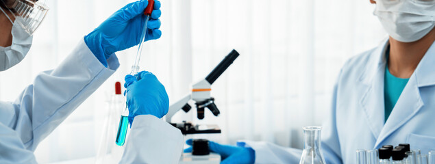 Laboratory researcher team advance healthcare with scientific expertise and laboratory equipment,...