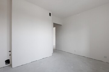 interior of the apartment without decoration in gray colors. rough finish