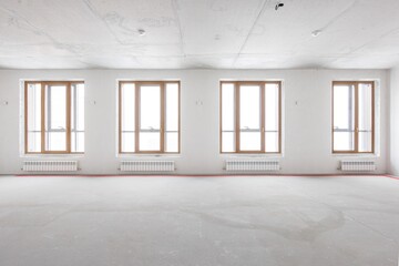 interior of the apartment without decoration in gray colors. rough finish