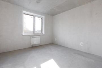 interior of the apartment without decoration in gray colors. rough finish